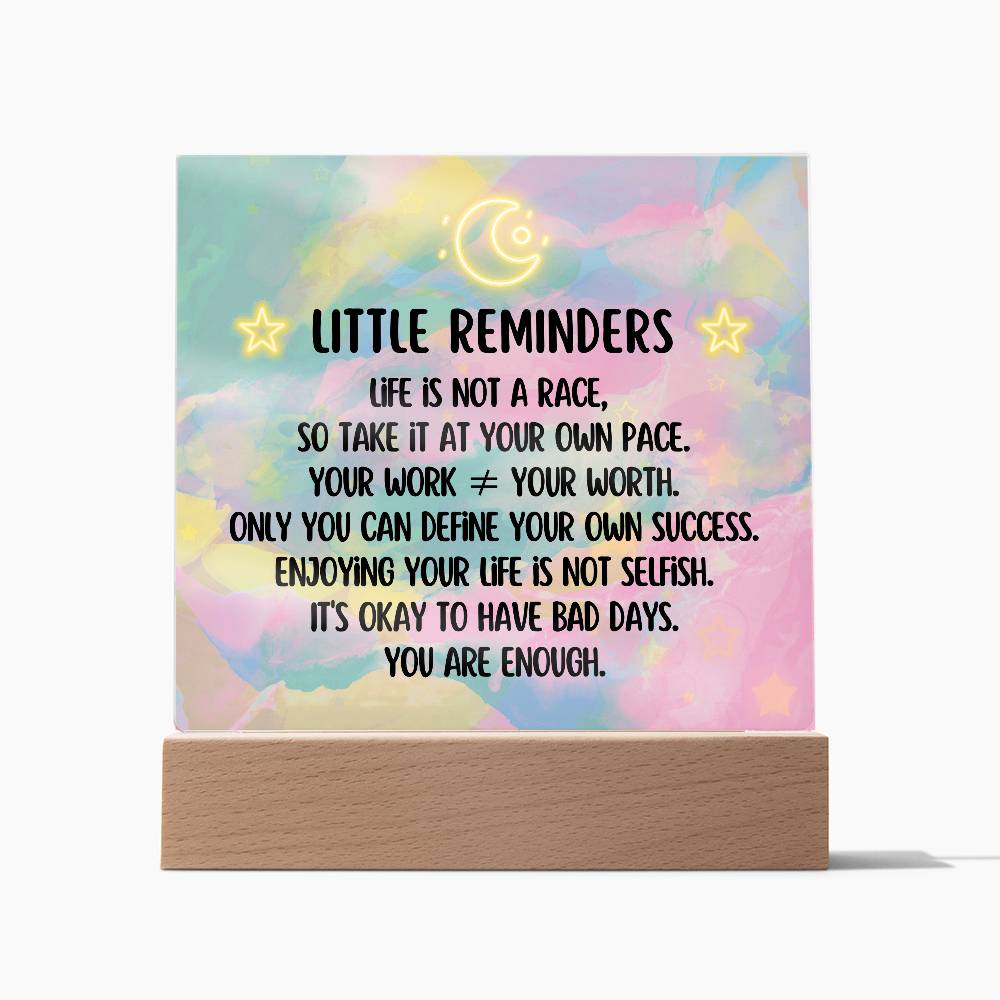 Spread some positivity with our Little Reminders Square Acrylic Plaque!