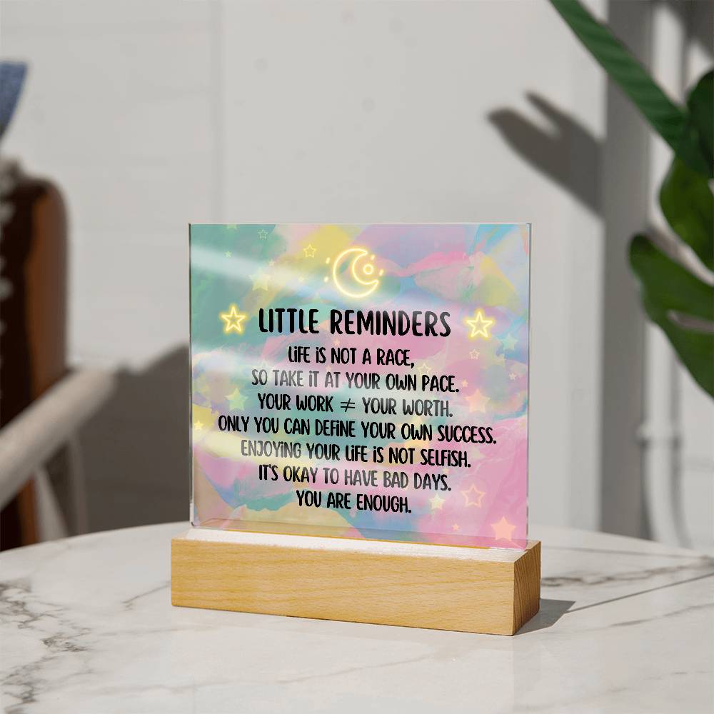 Spread some positivity with our Little Reminders Square Acrylic Plaque!