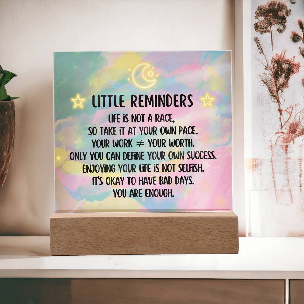 Spread some positivity with our Little Reminders Square Acrylic Plaque!