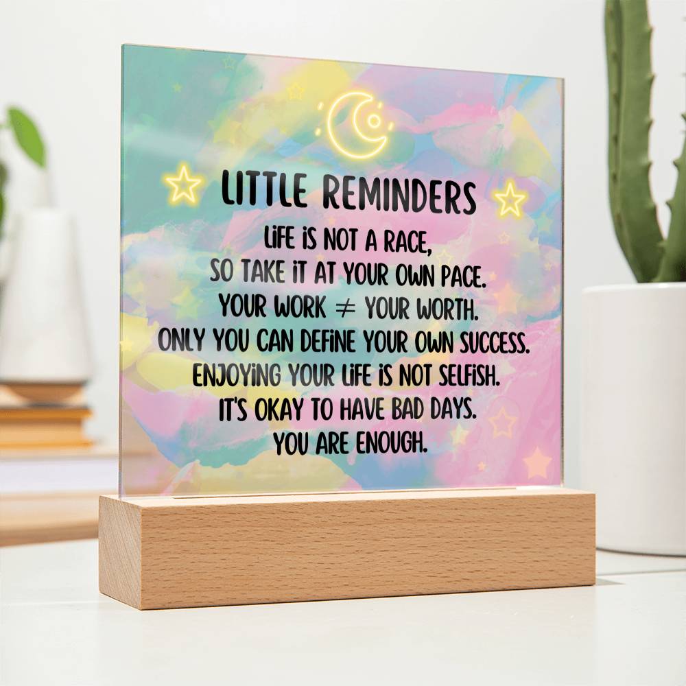 Spread some positivity with our Little Reminders Square Acrylic Plaque!