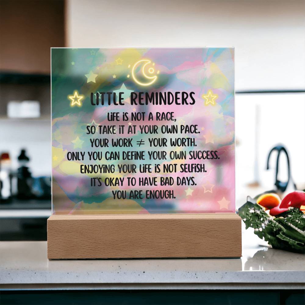 Spread some positivity with our Little Reminders Square Acrylic Plaque!