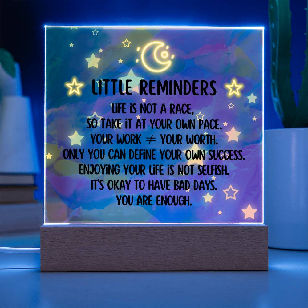 Spread some positivity with our Little Reminders Square Acrylic Plaque!